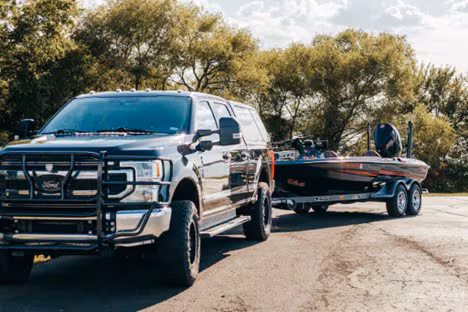 Truck with LEER Cap Pulling Fishing Boat