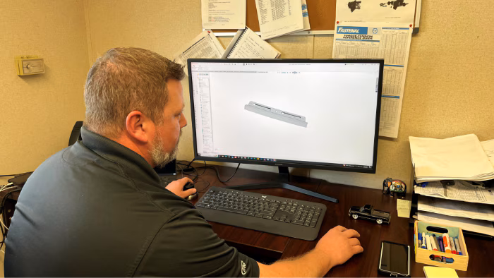 Jeff Hickey, Chief Design Engineer Working on Design for 2024 Toyota Tacoma Truck Cap